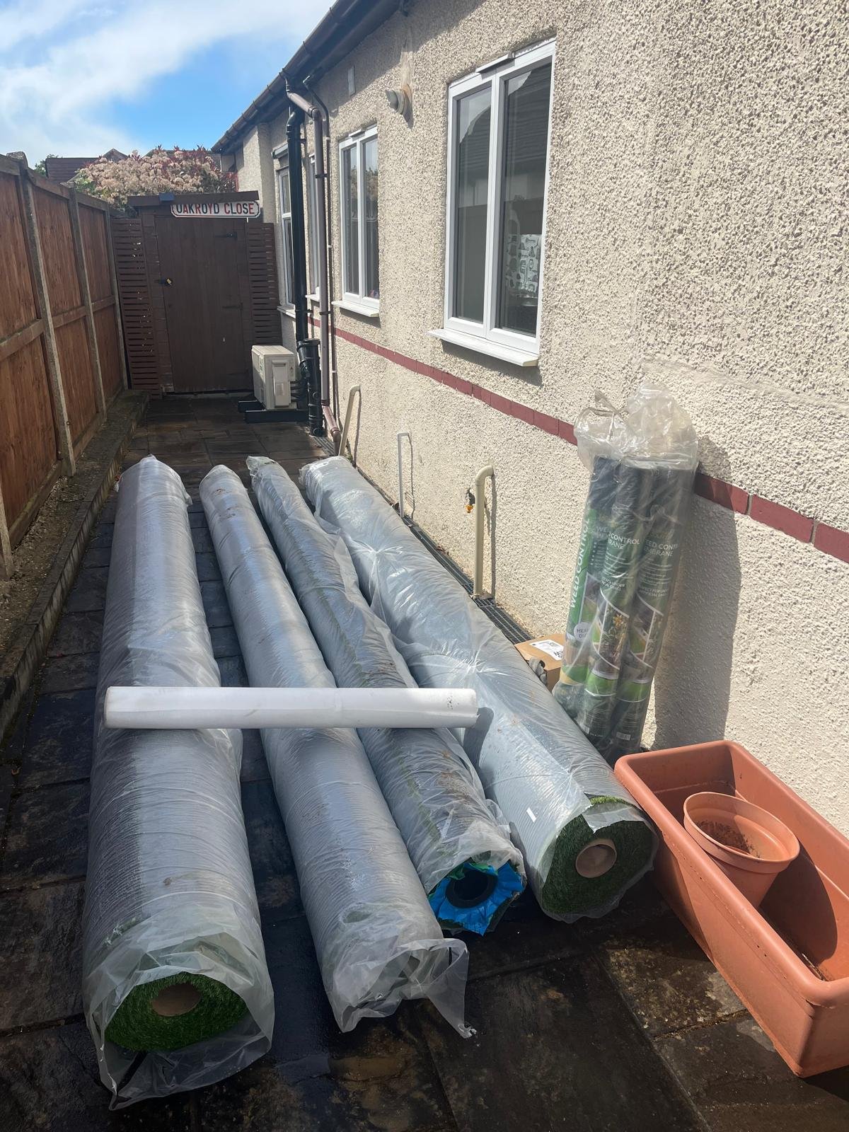 Artificial grass installation in progress by John Ruben Ltd in Potters Bar