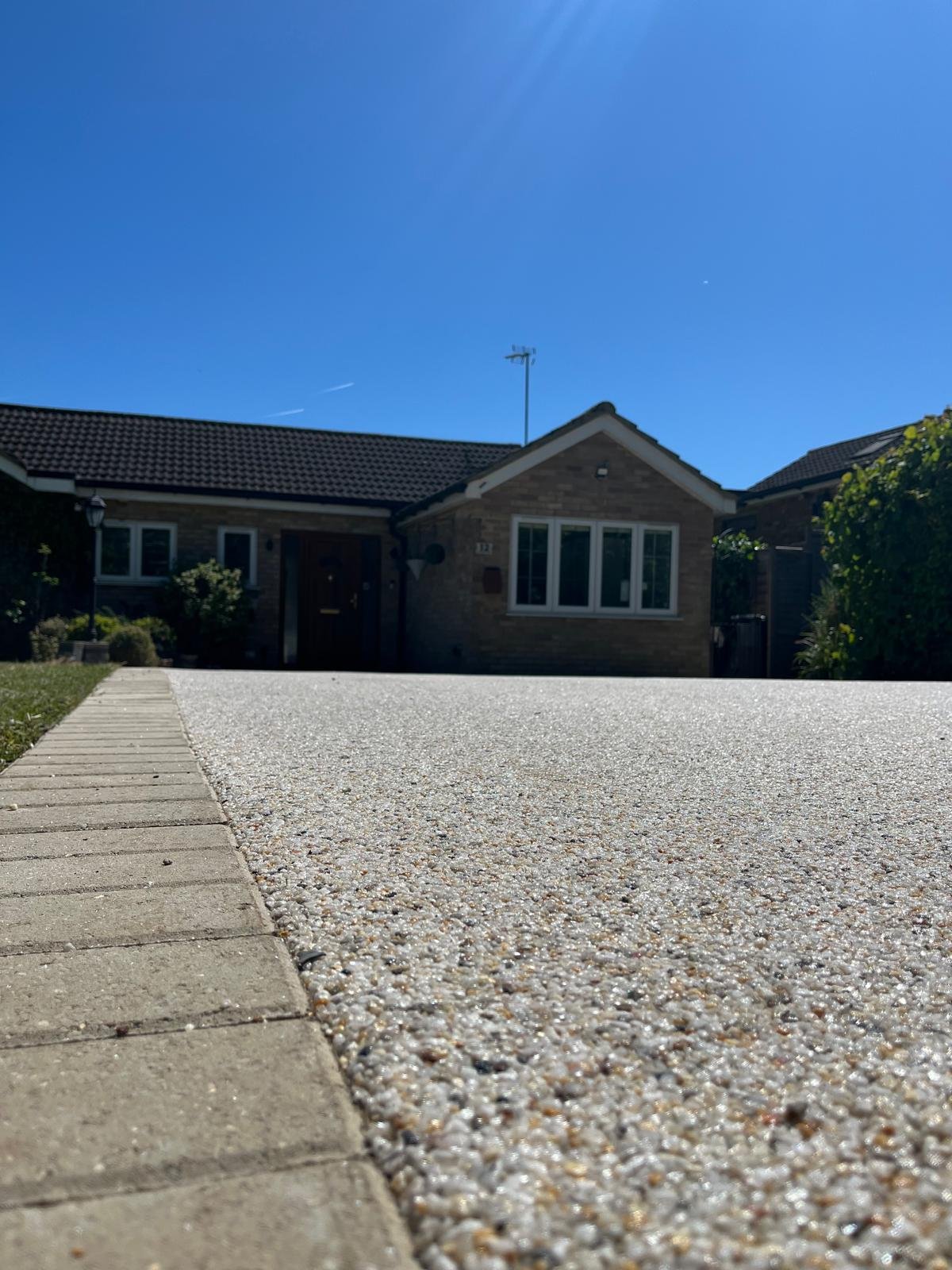 Resin bound driveway installed by John Ruben Ltd in Potters Bar