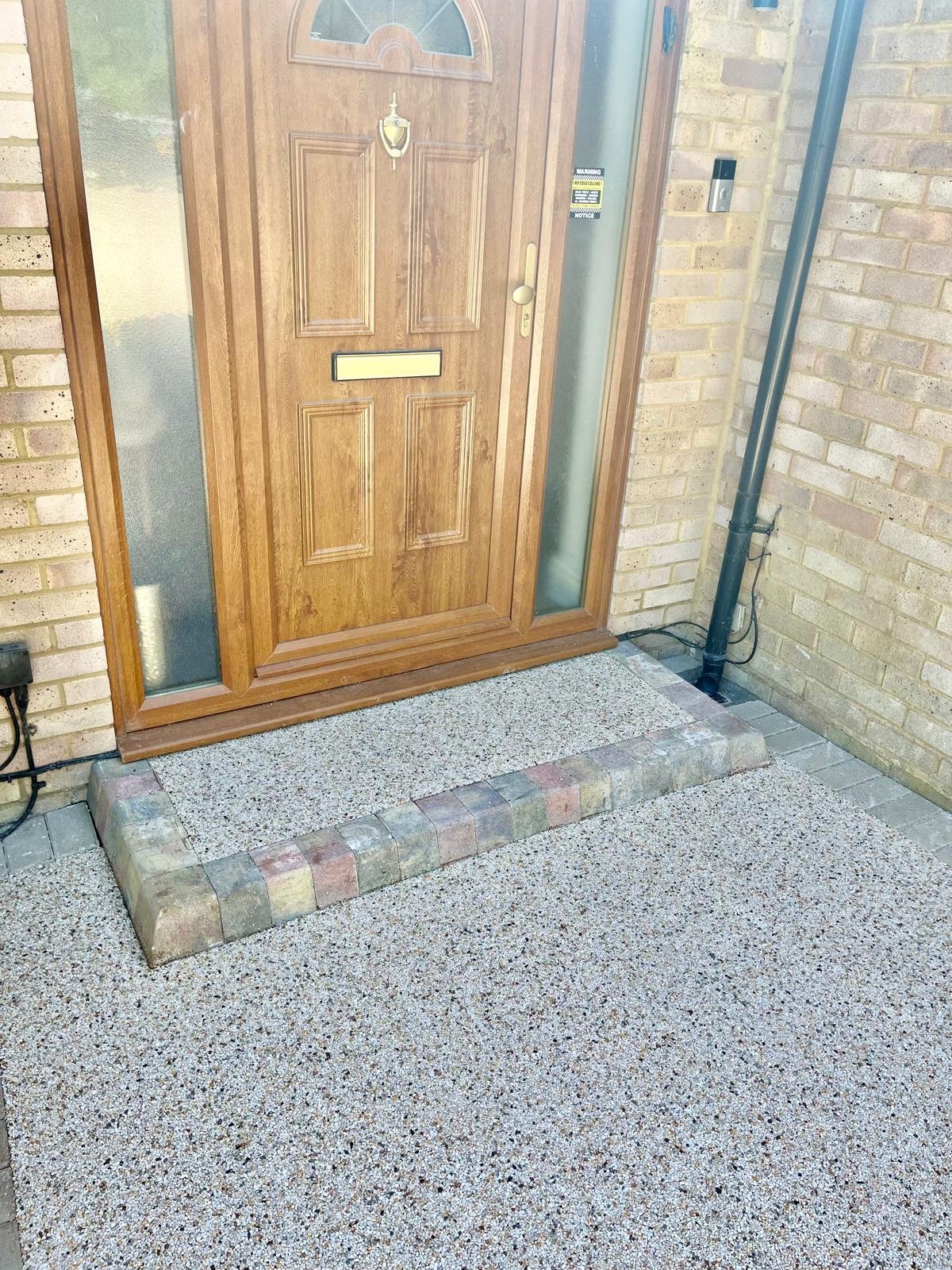Resin bound driveway installed by John Ruben Ltd in Potters Bar