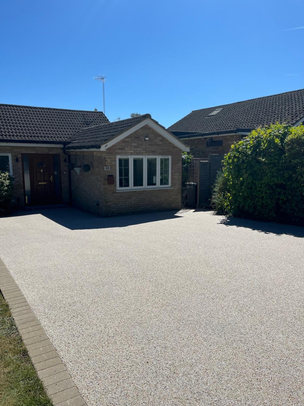 Resin bound driveway installed by John Ruben Ltd in Potters Bar