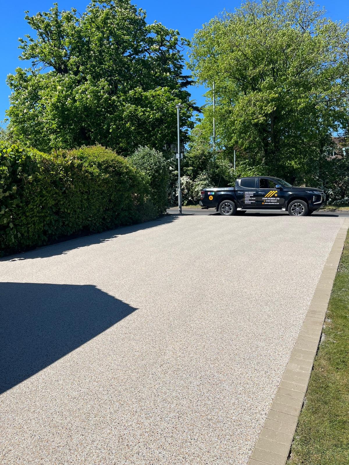 Resin bound driveway installed by John Ruben Ltd in Potters Bar