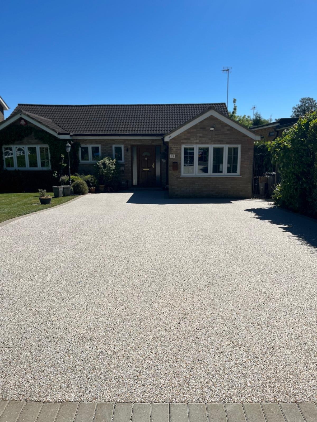 Resin bound driveway installed by John Ruben Ltd in Potters Bar