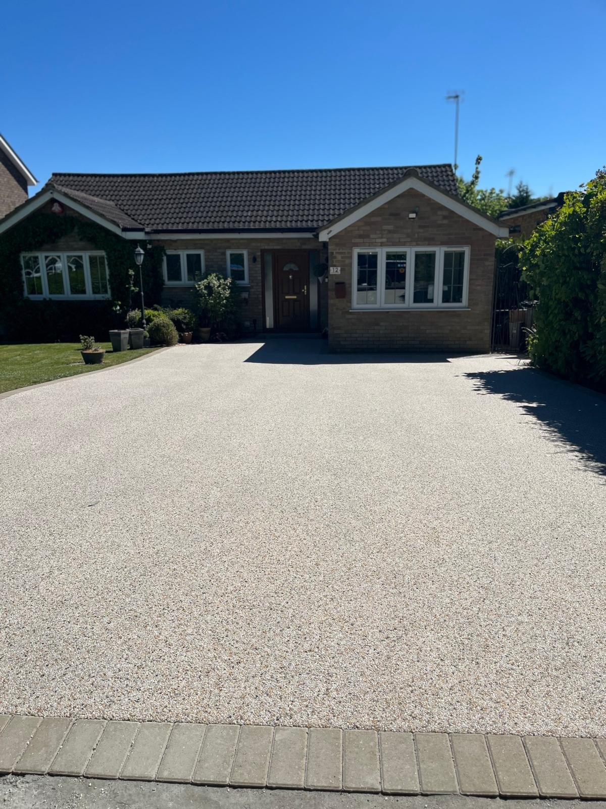 Resin bound driveway laid across the full frontage of a Potters Bar bungalow