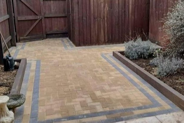 Block paving driveway laid in tan and grey blocks by John Ruben Ltd