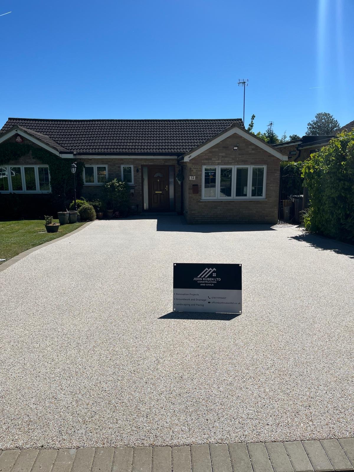 Resin bound driveway installed by John Ruben Ltd in Potters Bar