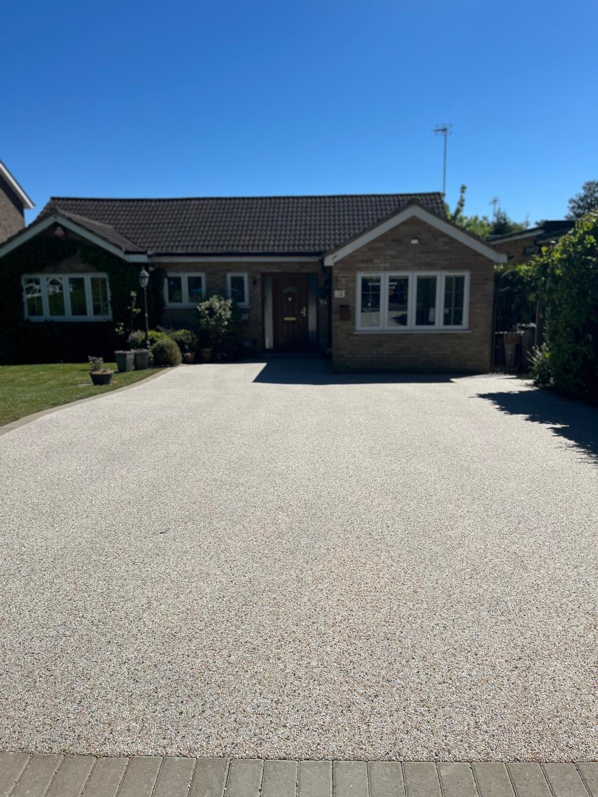 Resin bound driveway installed by John Ruben Ltd in Potters Bar
