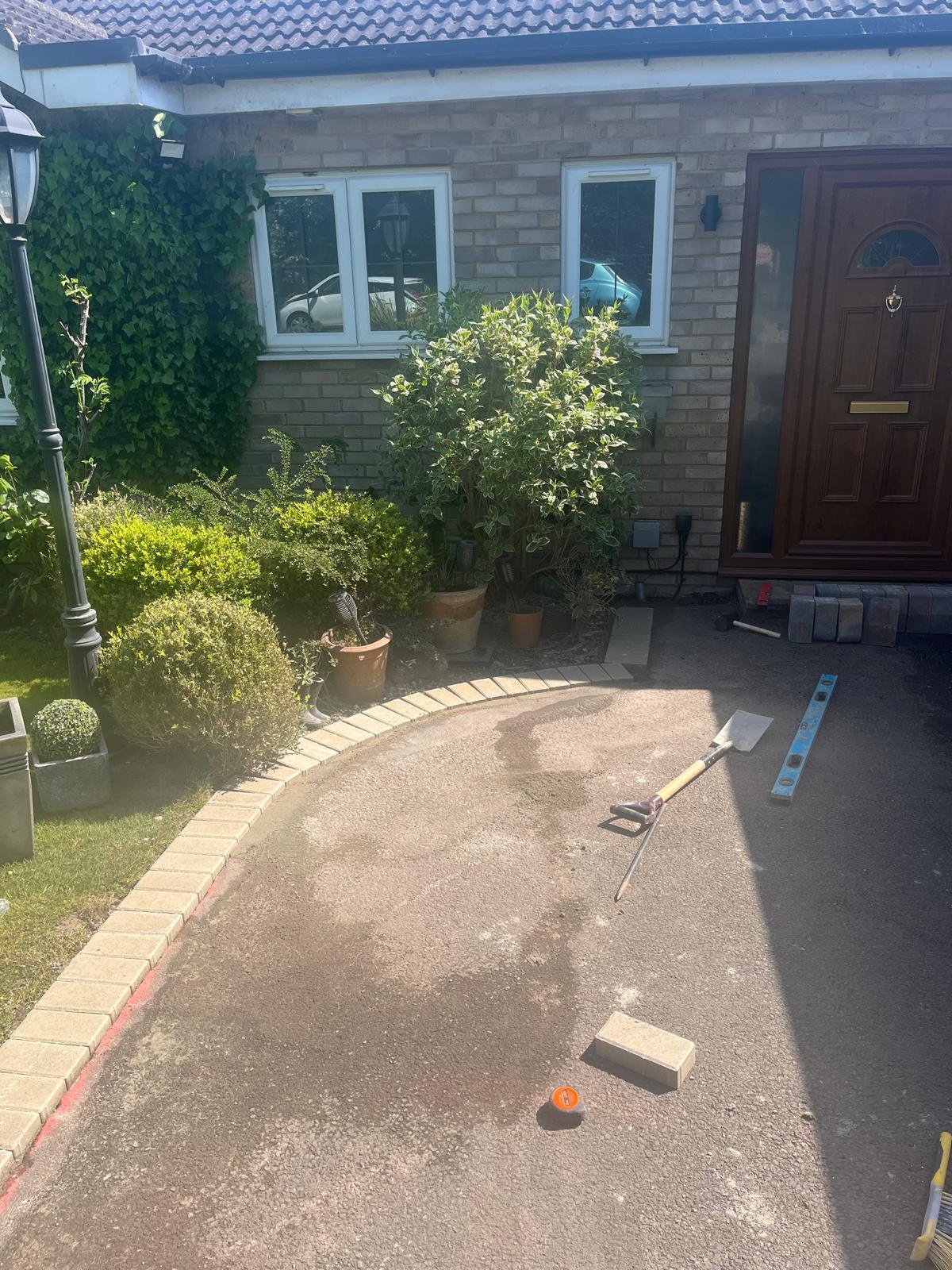 Resin bound driveway installation in progress by John Ruben Ltd in Potters Bar