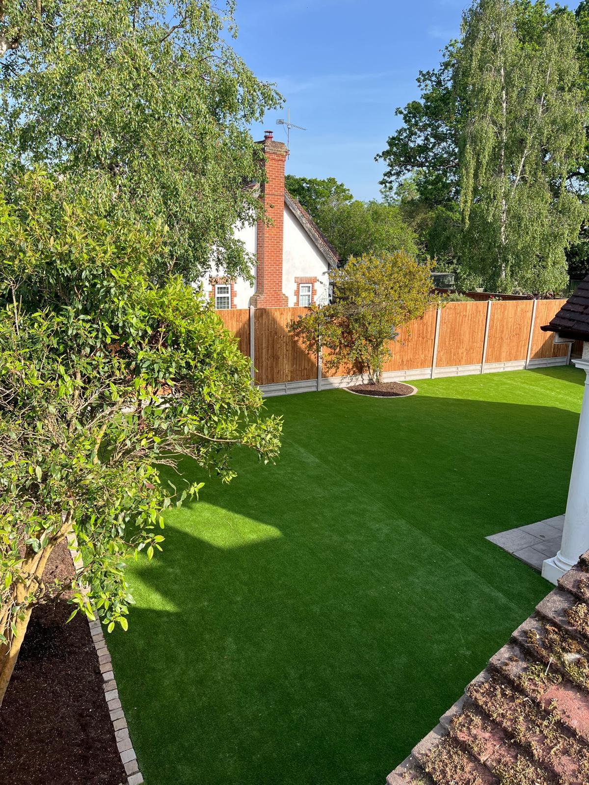 Artificial grass lawn installed in a residential garden