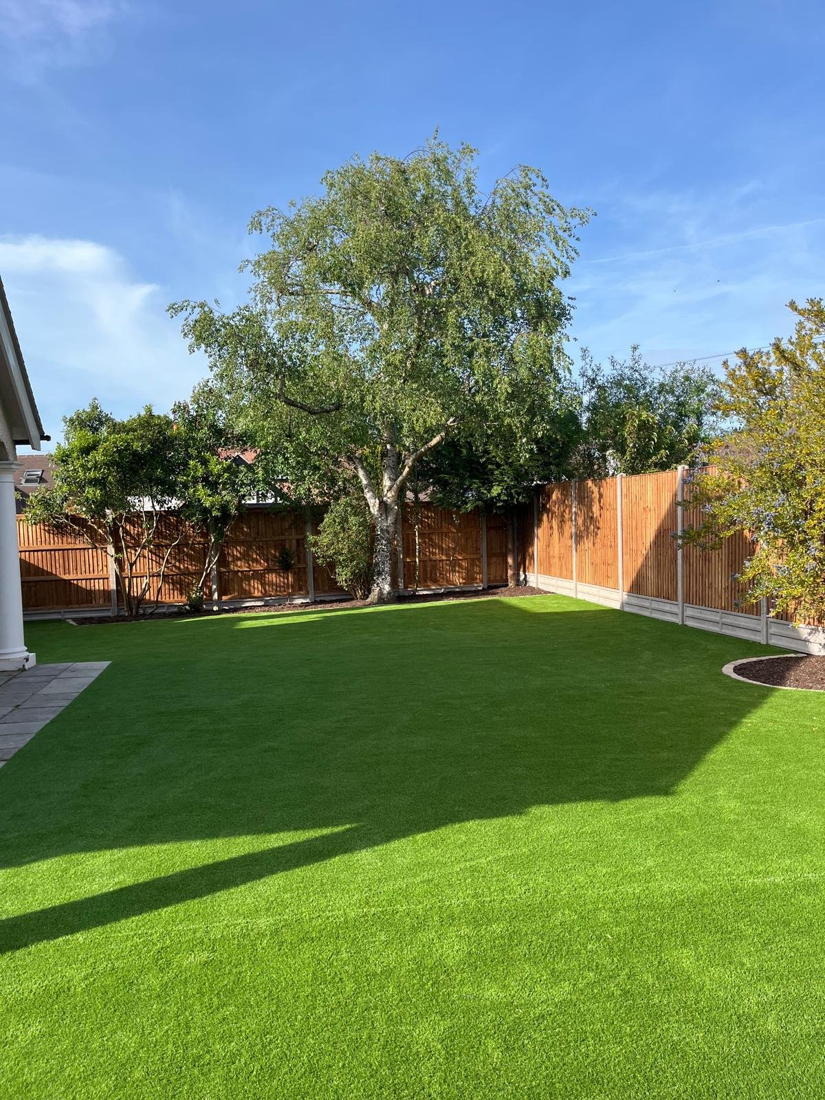 Artificial grass lawn installed by John Ruben Ltd in Potters Bar