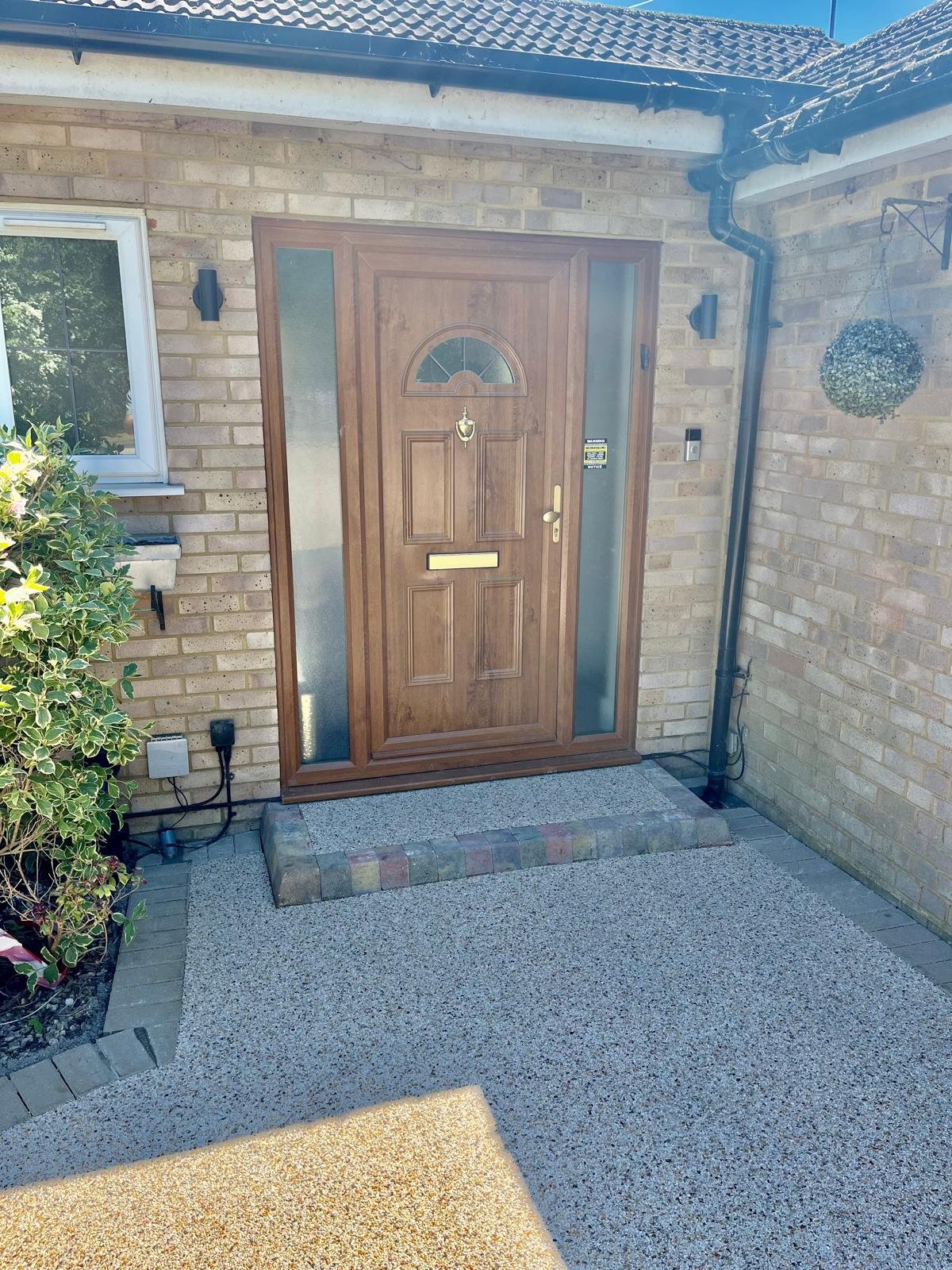 Resin bound driveway installed by John Ruben Ltd in Potters Bar