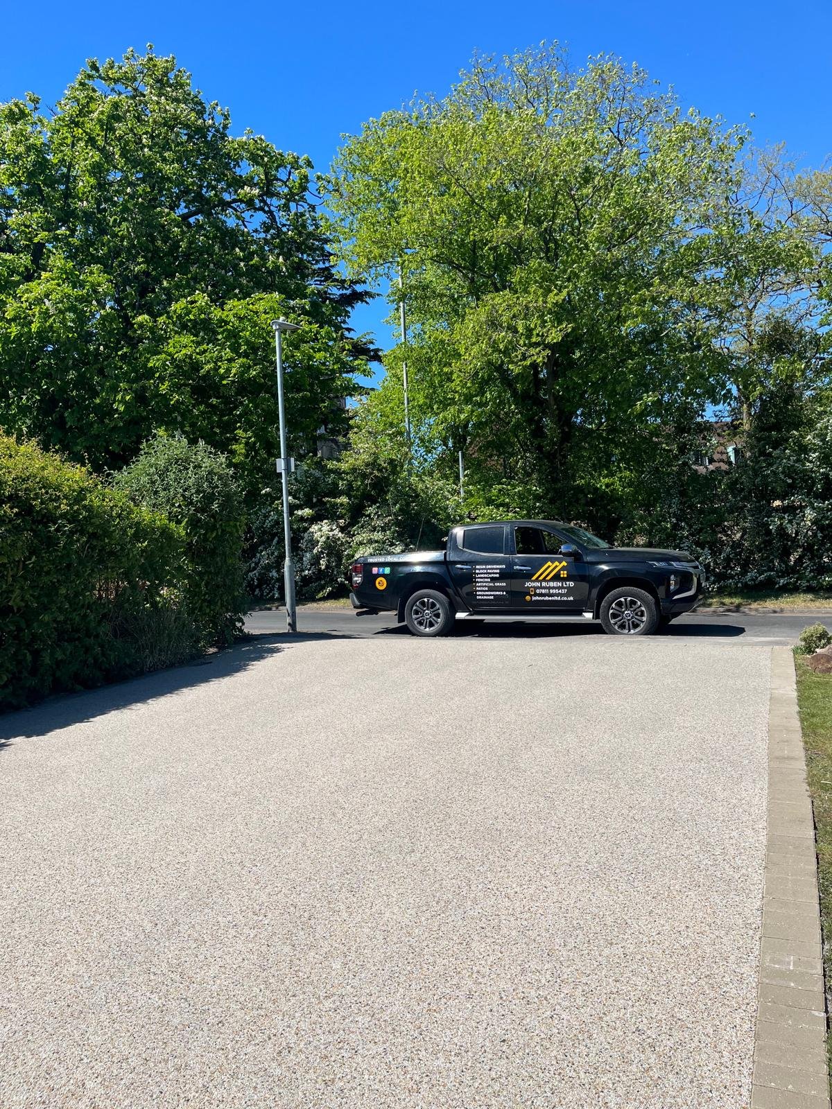 Resin bound driveway installed by John Ruben Ltd in Potters Bar