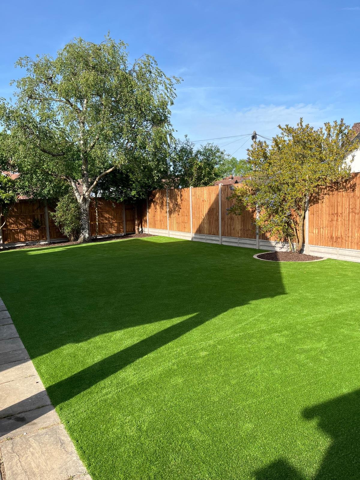 Artificial grass lawn installed by John Ruben Ltd in Potters Bar