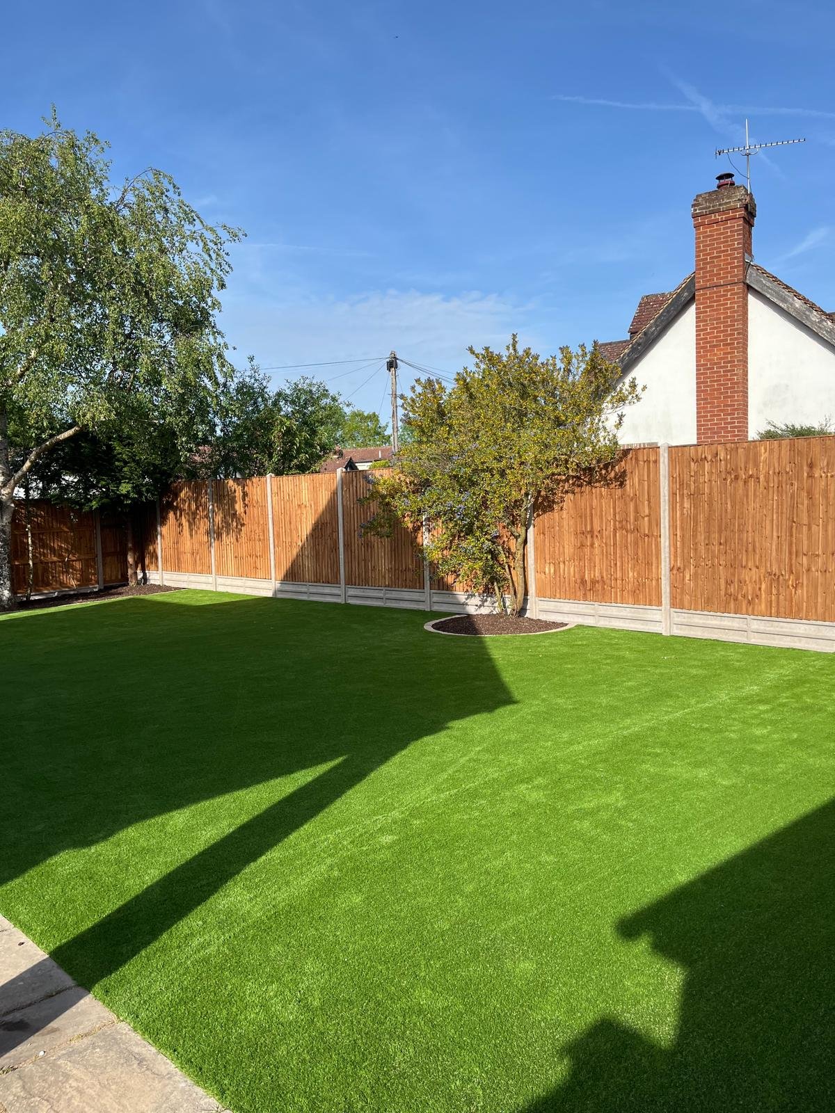 Artificial grass lawn installed by John Ruben Ltd in Potters Bar