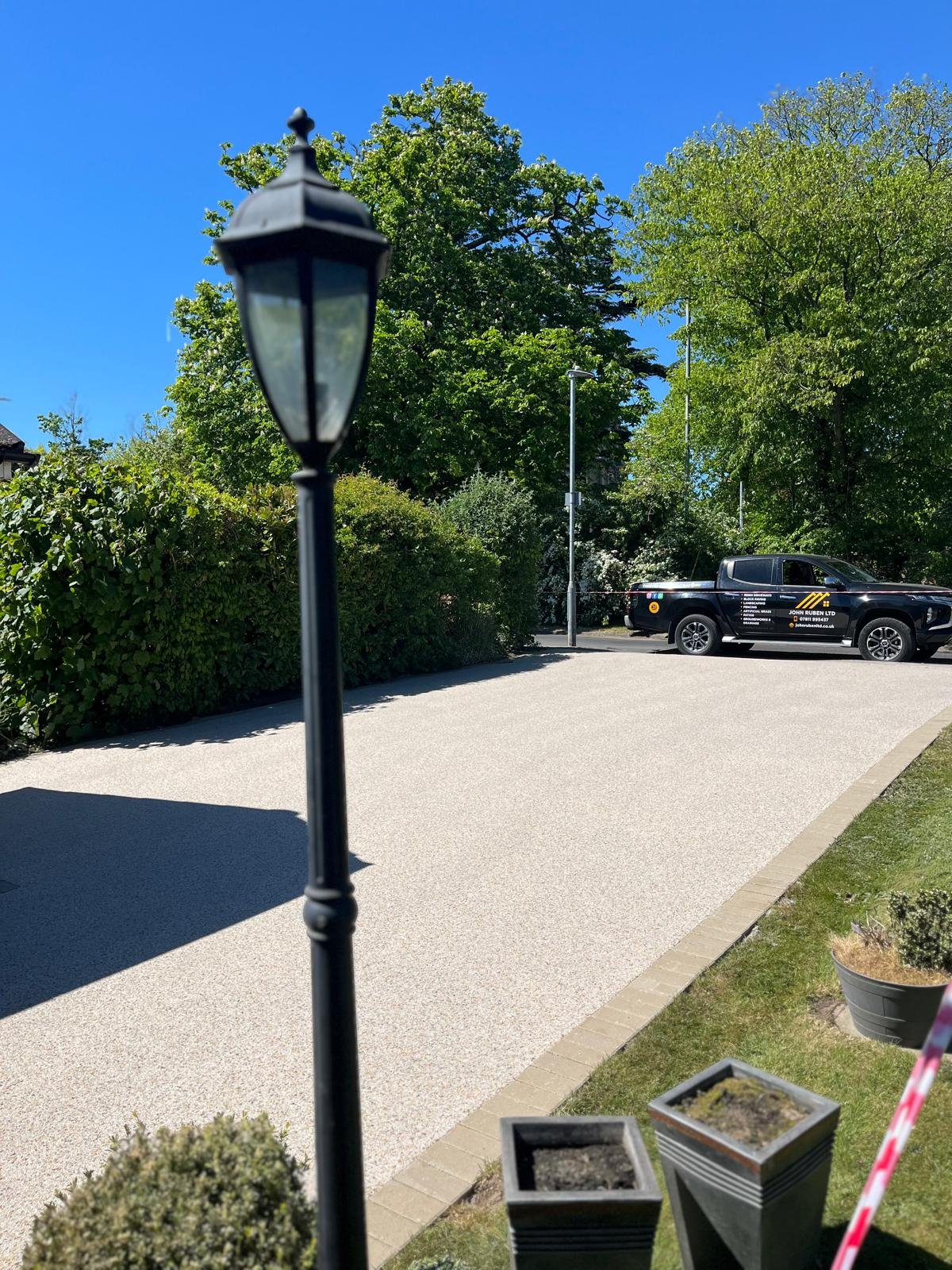 Resin bound driveway installed by John Ruben Ltd in Potters Bar