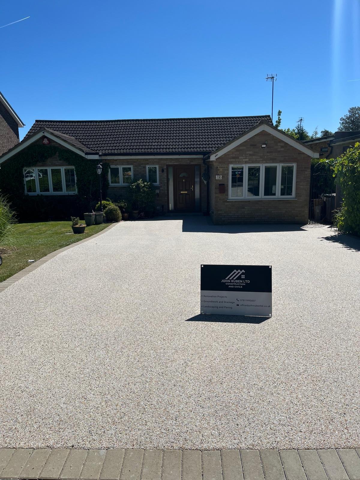Resin bound driveway installed by John Ruben Ltd in Potters Bar